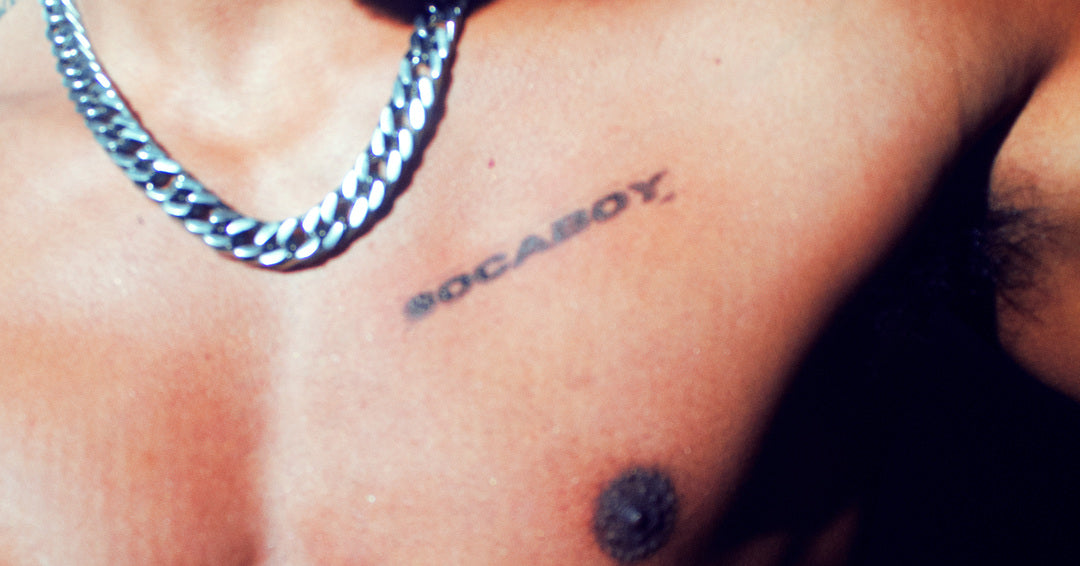 Load video: a bts fashion film of a Socaboy photoshoot. Pictured is the photoshoot, photographer, models, products. The photoshoot was outside in Melbourne CBD.